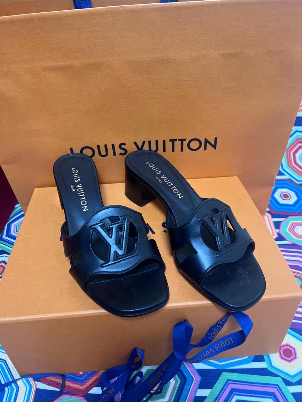 Louis Vuitton Black Leather LV Cutout Slip-On Mules